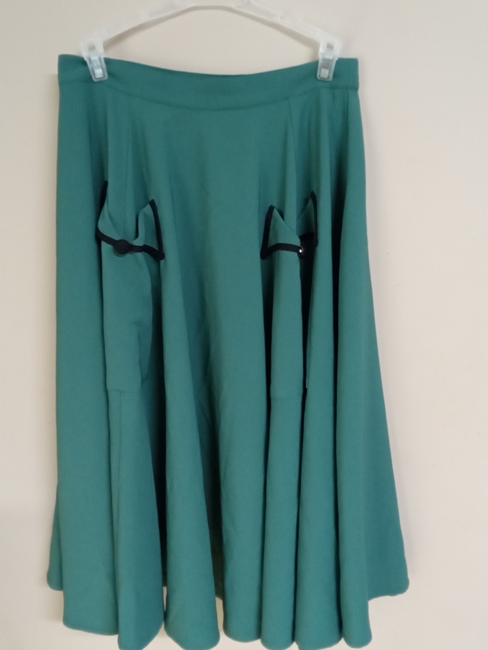 A-Line Midi Skirt in Emerald Green with Decorative Bow Details